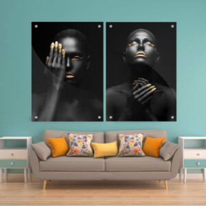 שתי תמונות זכוכית של נשות אפריקה בצבע כהה עם אלמנטים מוזהבים, מייצרות אפקט מרהיב עם ניגודיות ויופי ייחודי.